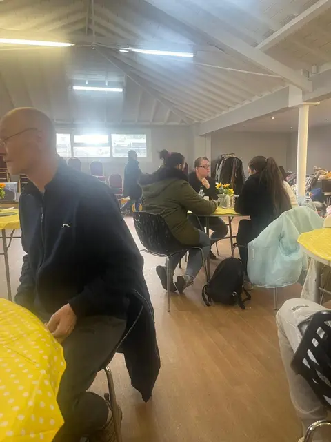 Guests sitting down for lunch at the Full Gospel Tabernacle Community Café Birmingham