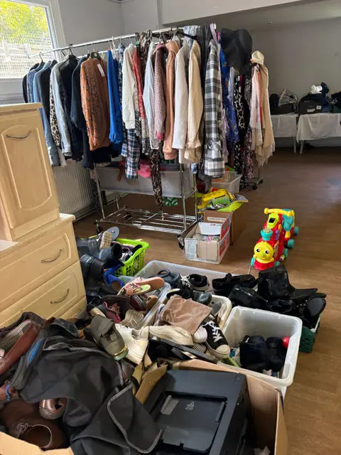 Free clothes, shoes and toys at the Full Gospel Tabernacle clothes bank Birmingham