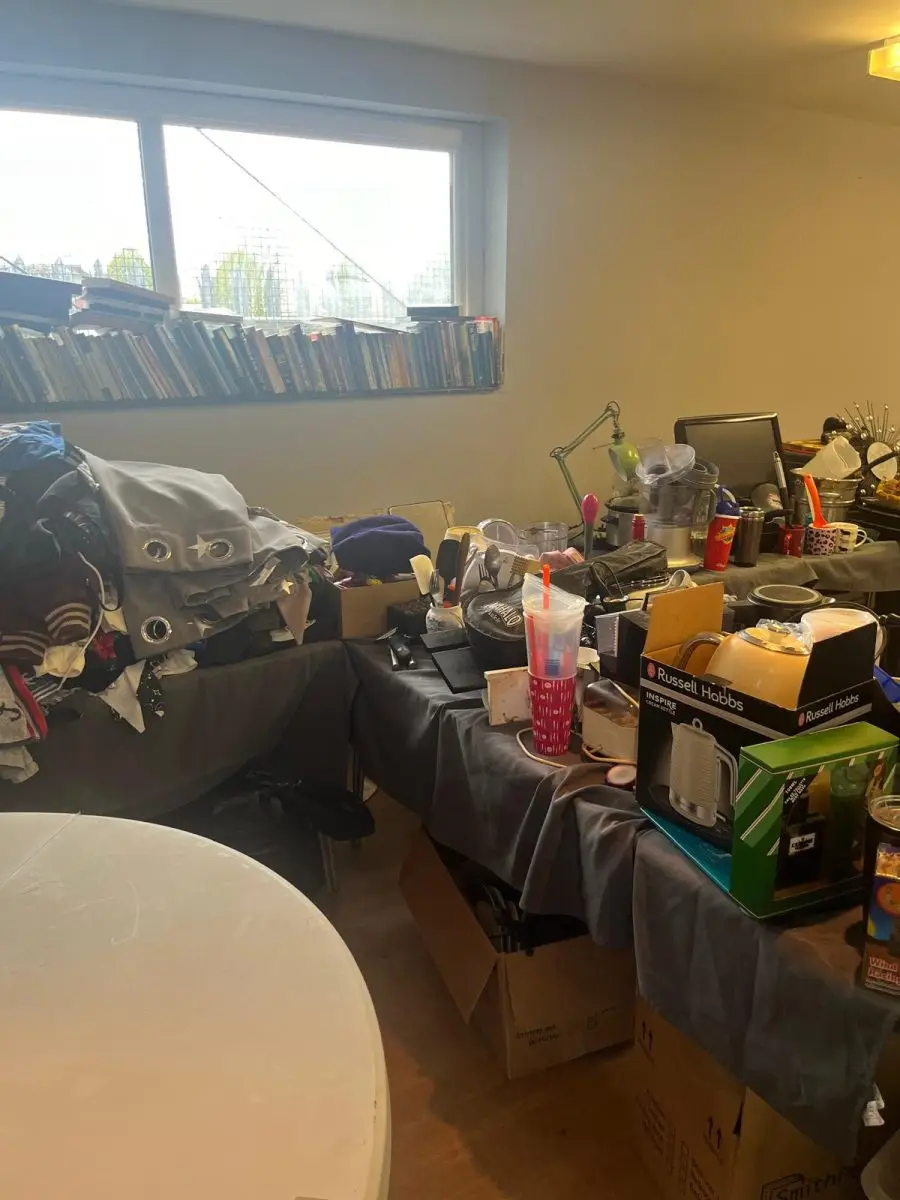 Tables of donated clothes and household items at Full Gospel Tabernacle Birmingham