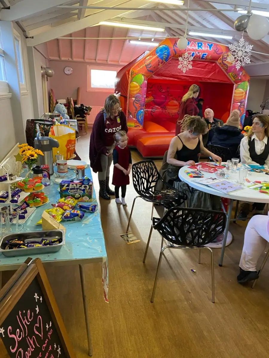 Bouncy castle and craft tables at a Full Gospel Tabernacle community family day Birmingham